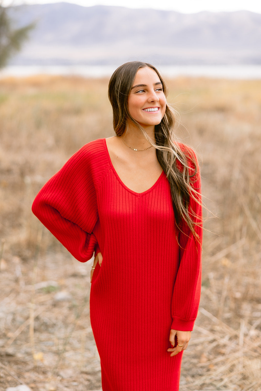 red dress with sweater Outfit Sweater Dress in Candy Red